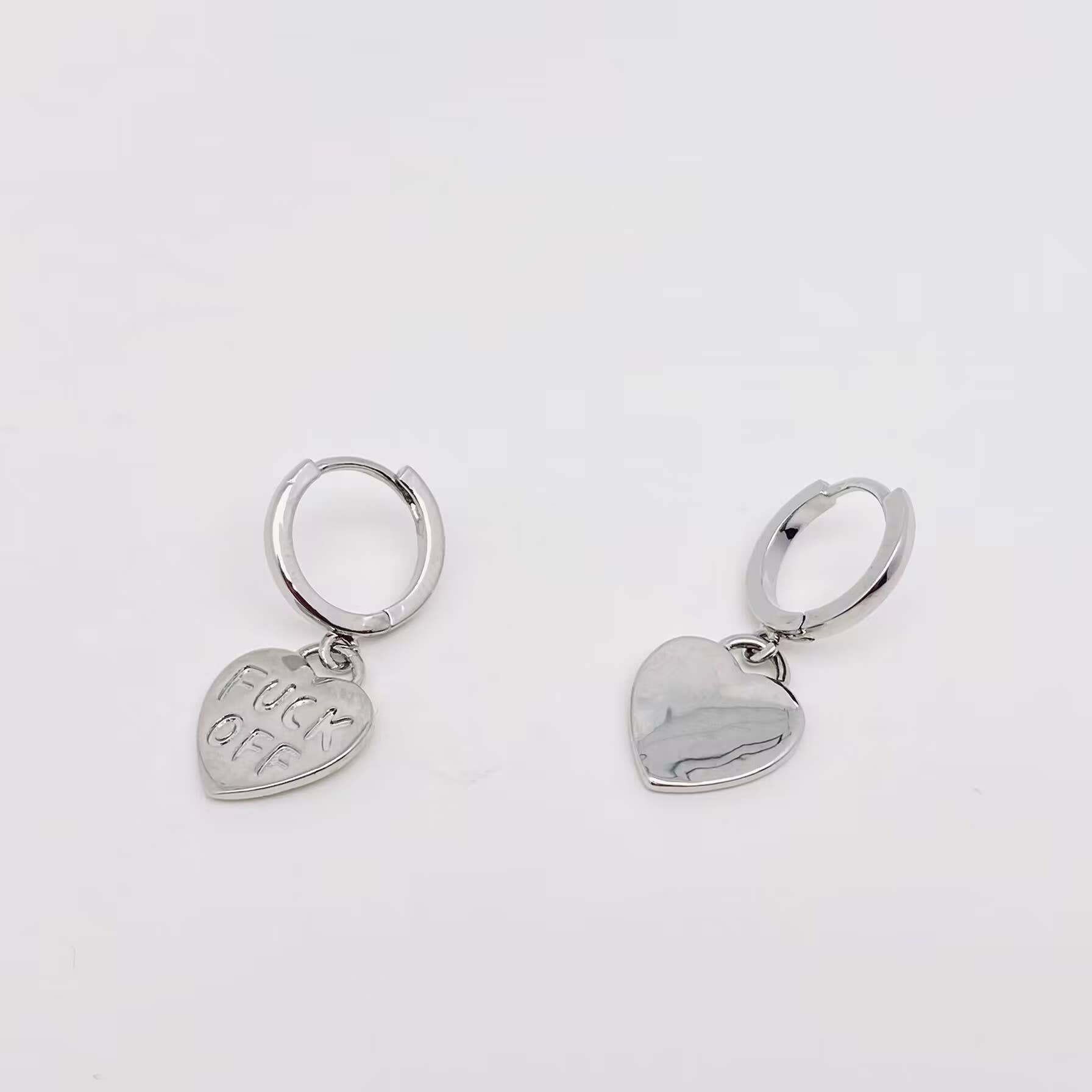 "Fuck off" Heart-shaped Silver Plated Huggie Earrings - UnLaced Boutique