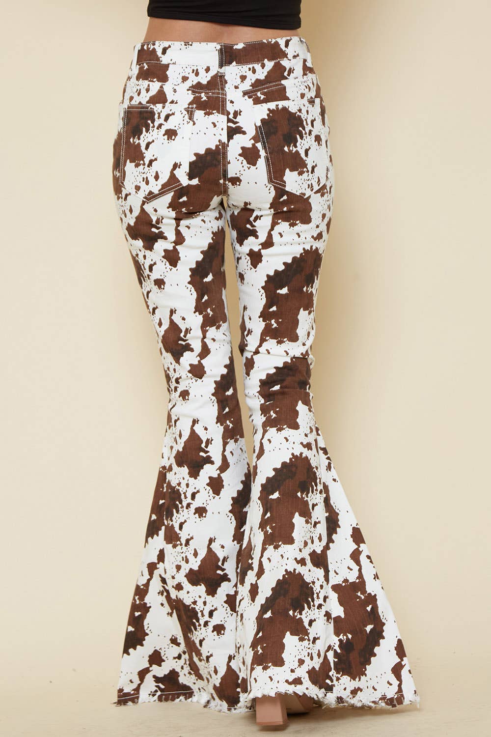 IVORY BROWN WESTERN COW PRINT FLARES- BESTSELLER - UnLaced Boutique