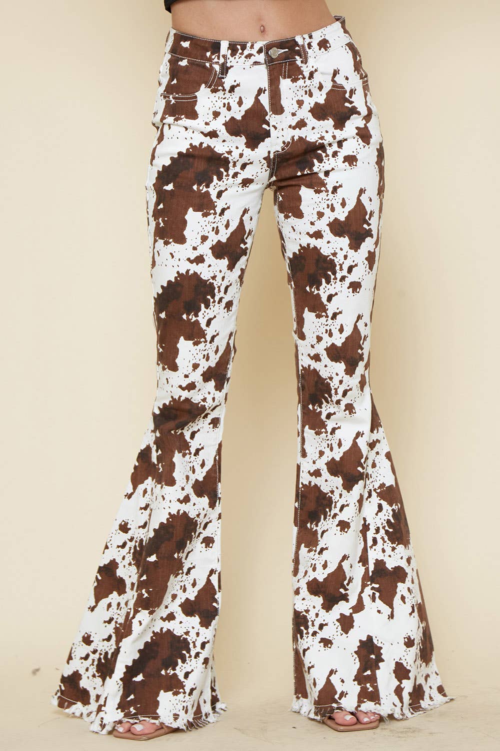 IVORY BROWN WESTERN COW PRINT FLARES- BESTSELLER - UnLaced Boutique
