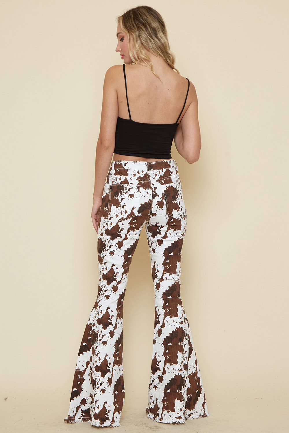 IVORY BROWN WESTERN COW PRINT FLARES- BESTSELLER - UnLaced Boutique