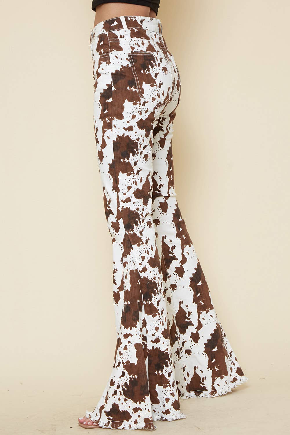 IVORY BROWN WESTERN COW PRINT FLARES- BESTSELLER - UnLaced Boutique