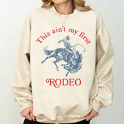 This Ain't My First Rodeo, Cowgirl Sweatshirt - UnLaced Boutique